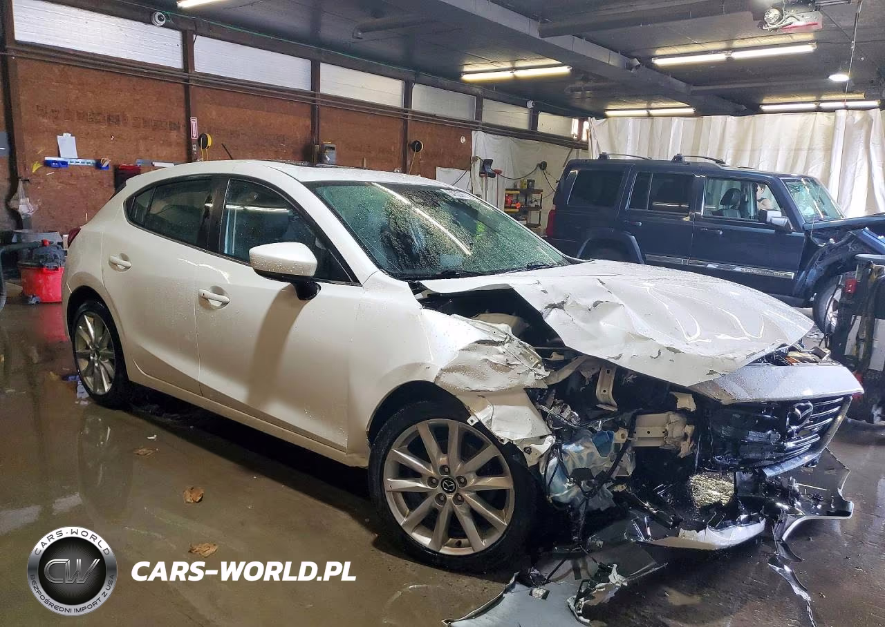 2017 Mazda 3 Touring VIN:JM1BN1L31H1146046 - 4