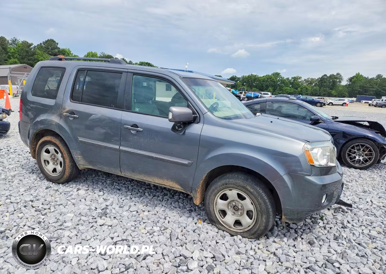 2011 Honda Pilot Touring VIN:5FNYF4H93BB101856 - 4