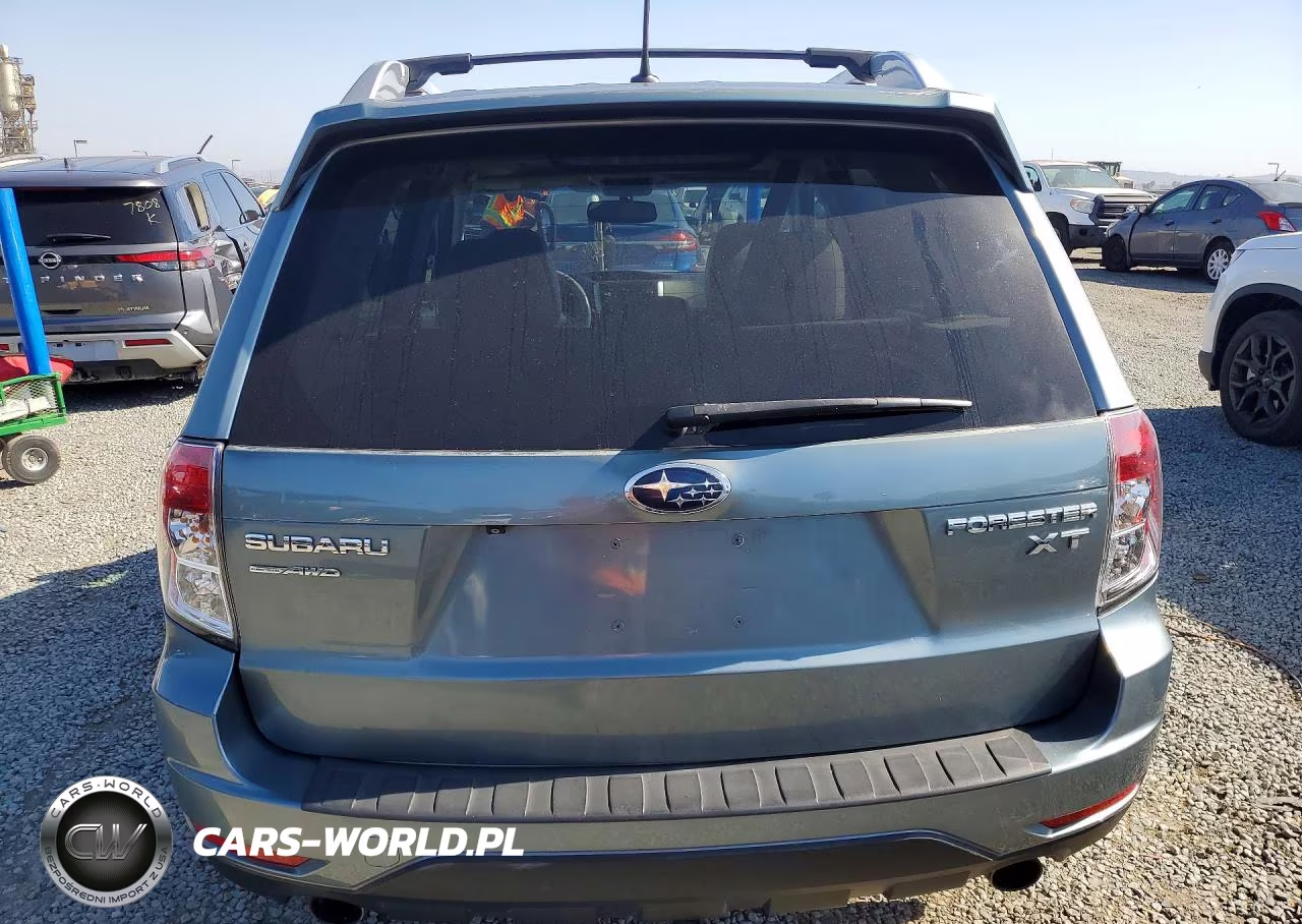 2011 Subaru Forester Touring VIN:JF2SHGGC4BH701088 - 6