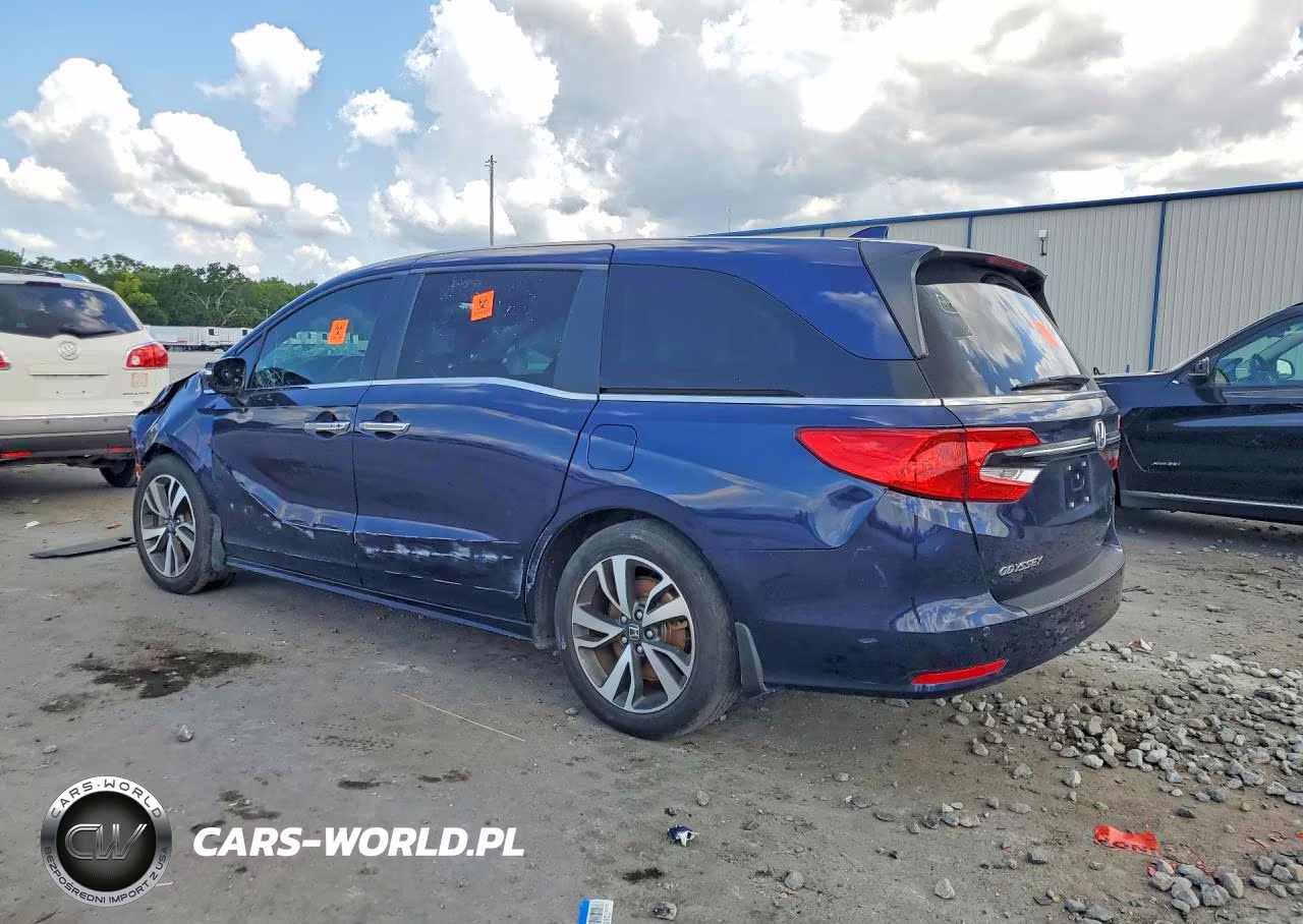 2023 Honda Odyssey Touring VIN:5FNRL6H87PB064043 - 2