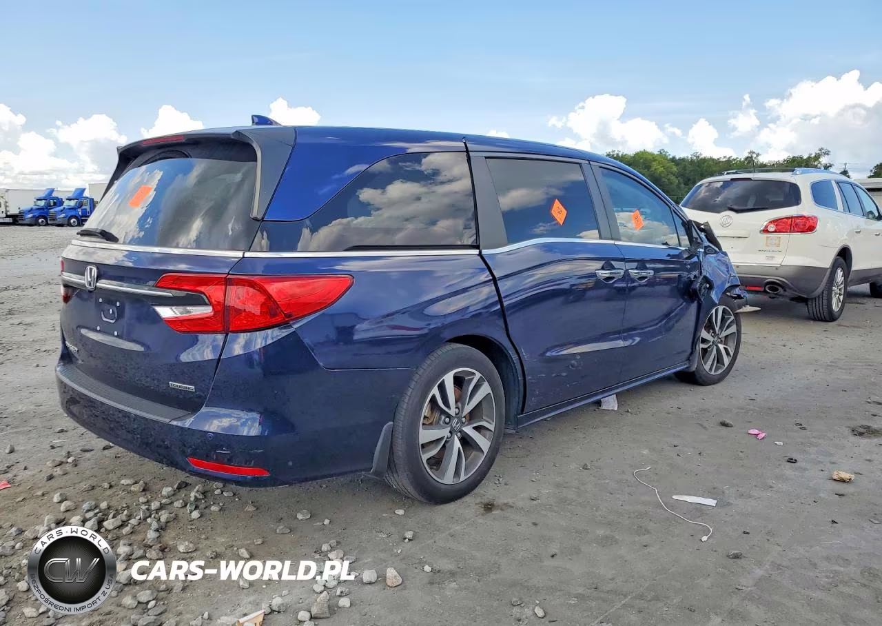 2023 Honda Odyssey Touring VIN:5FNRL6H87PB064043 - 3