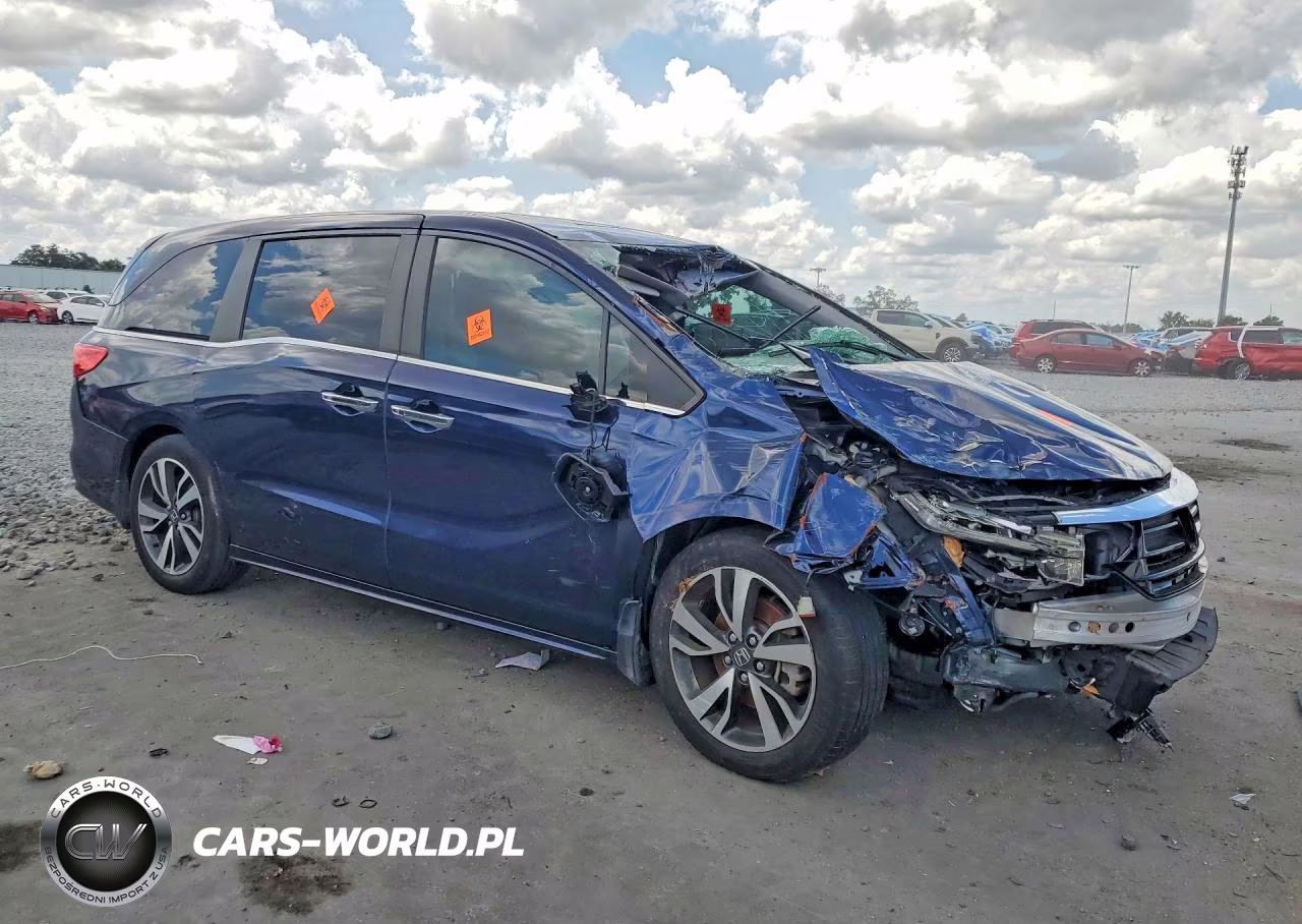 2023 Honda Odyssey Touring VIN:5FNRL6H87PB064043 - 4