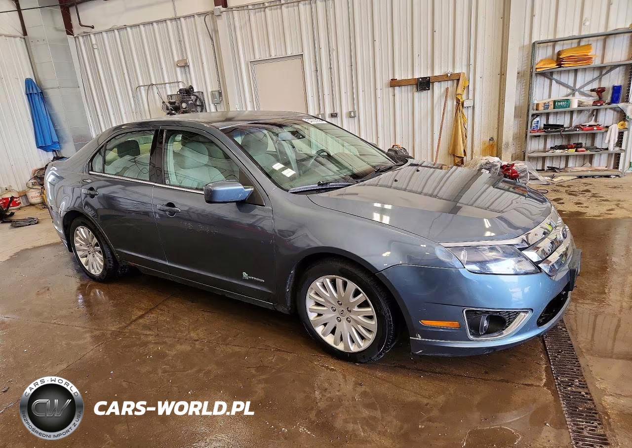 2012 Ford Fusion Hybrid VIN:3FADP0L37CR325869 - 4