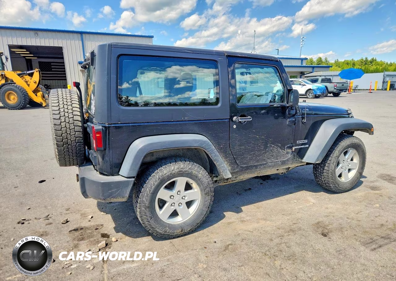 2012 Jeep Wrangler Sport VIN:1C4GJWAG9CL250429 - 3