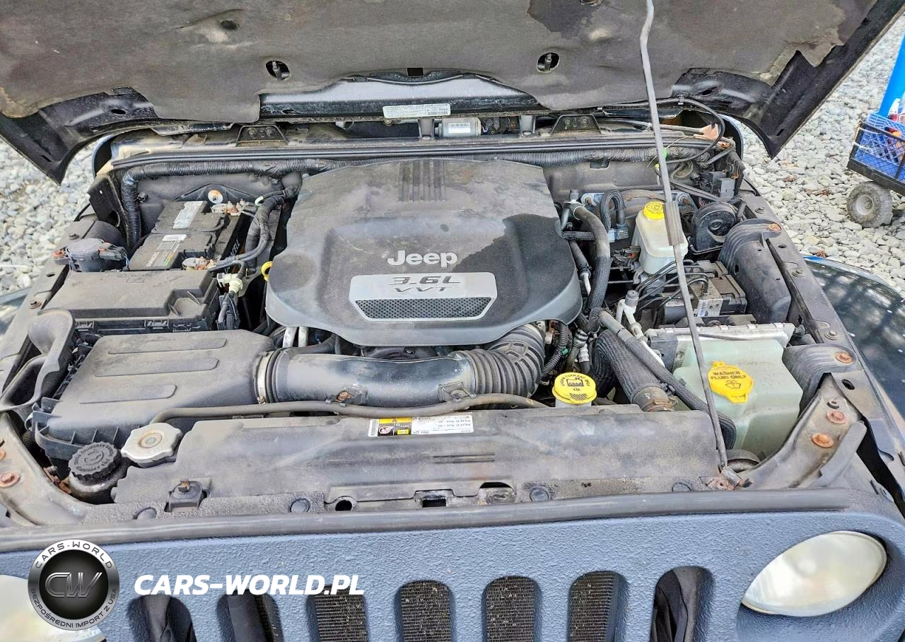 2013 Jeep Wrangler Unlimited Sahara VIN:1C4HJWEG1DL614360 - 12