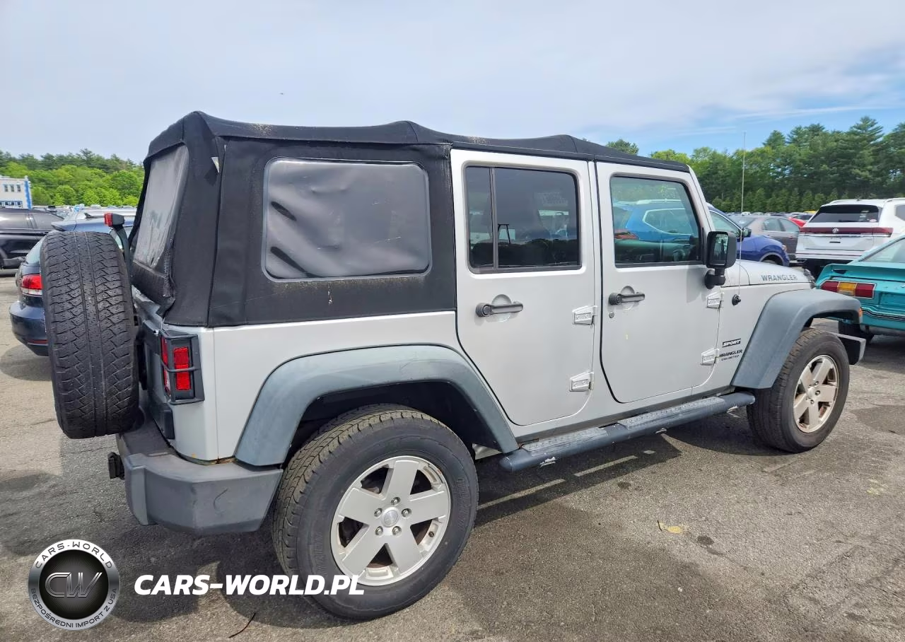 2010 Jeep Wrangler Unlimited Sport VIN:1J4HA3H14AL224672 - 3