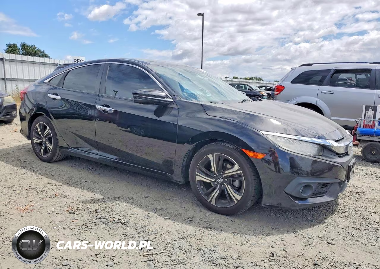 2017 Honda Civic Touring VIN:2HGFC1F9XHH654526 - 4