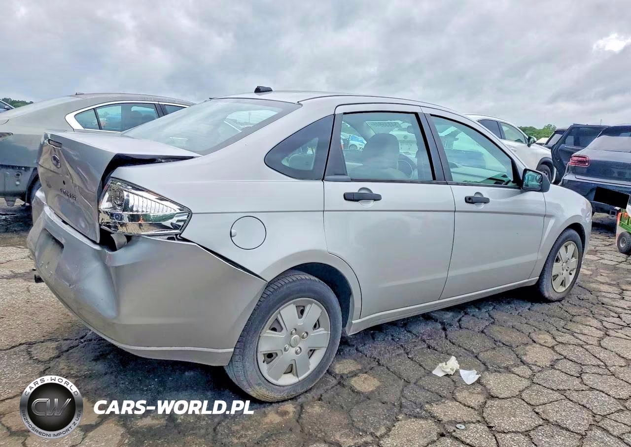 2009 Ford Focus S VIN:1FAHP34N49W131132 - 3