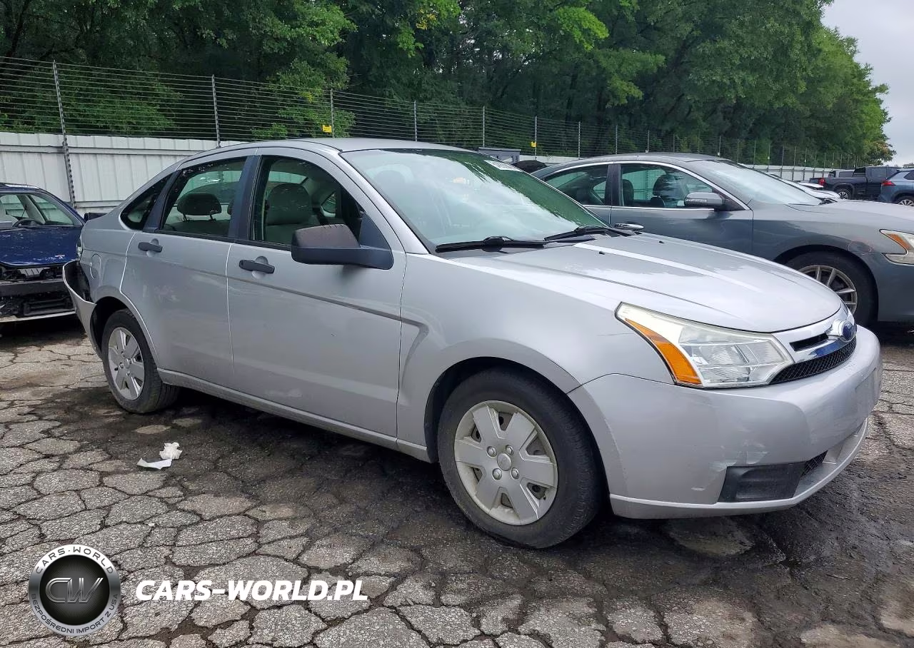 2009 Ford Focus S VIN:1FAHP34N49W131132 - 4