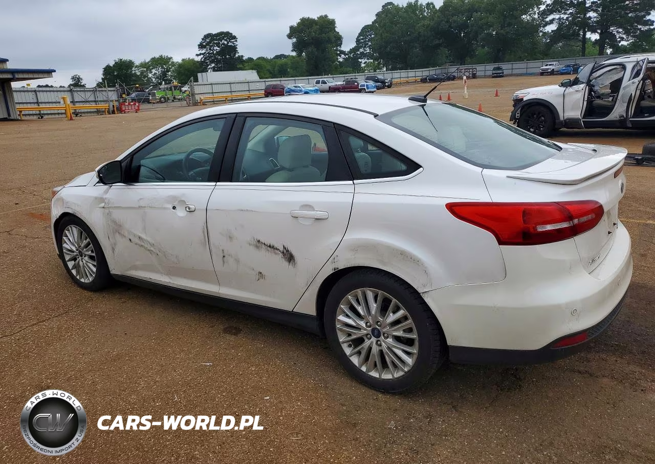 2016 Ford Focus Titanium VIN:1FADP3J27GL369208 - 2