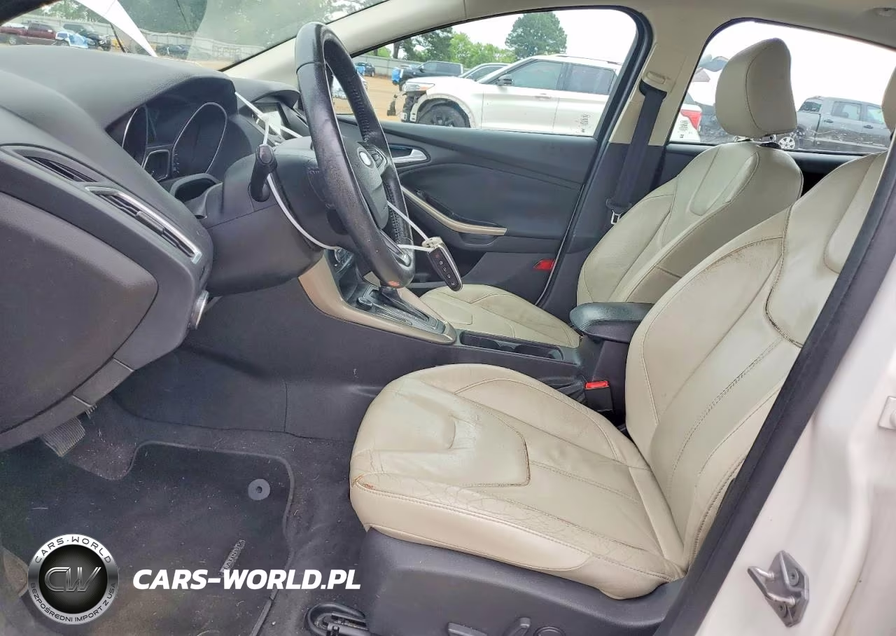 2016 Ford Focus Titanium VIN:1FADP3J27GL369208 - 7