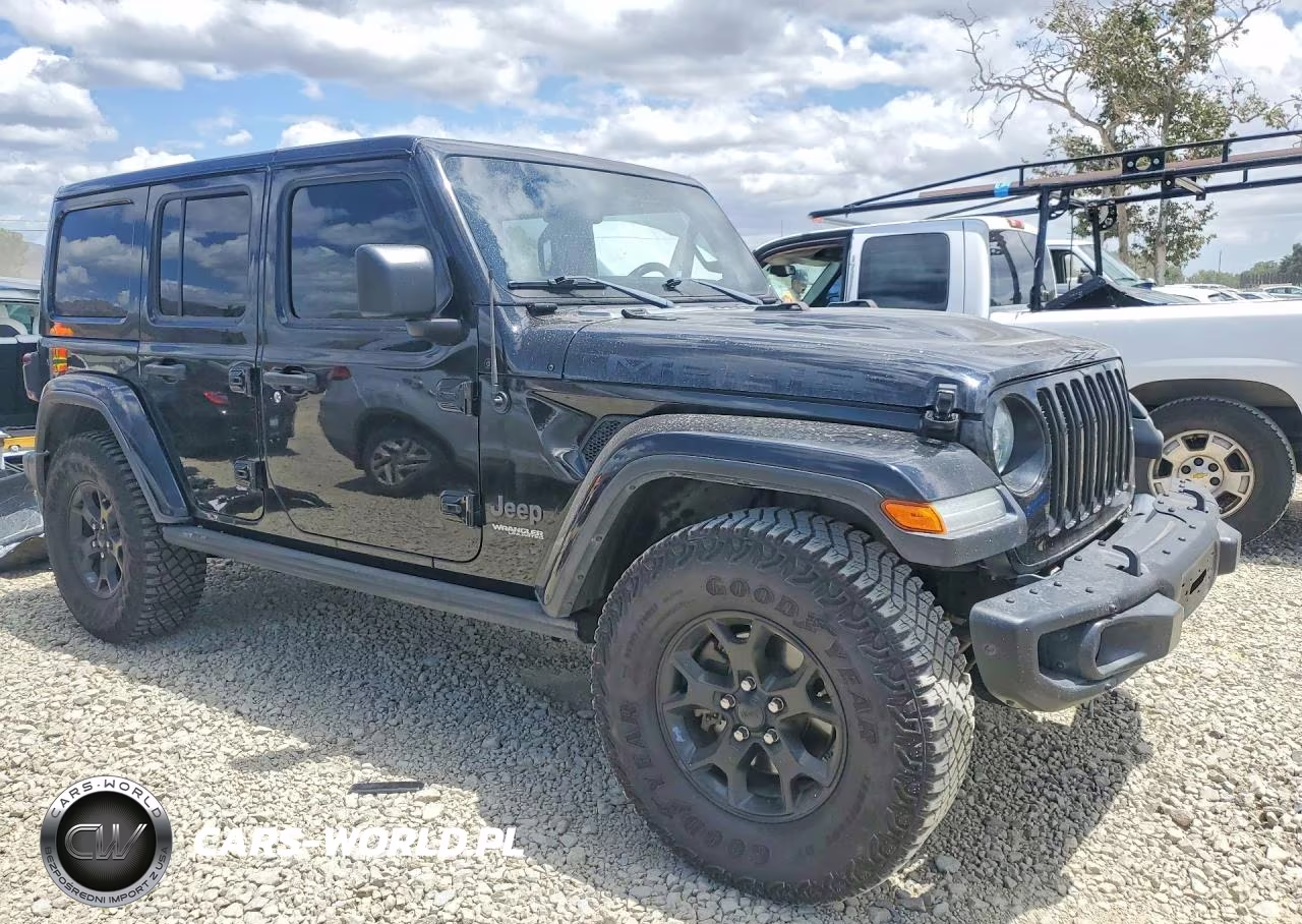 2018 Jeep Wrangler Unlimited Sahara VIN:1C4HJXEG2JW312835 - 4