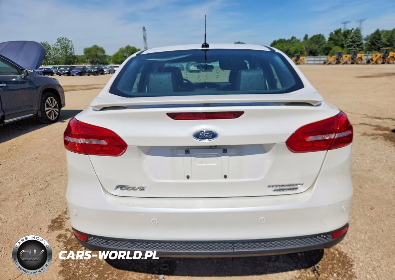 2015 Ford Focus Titanium VIN:1FADP3J27FL273934 - 6