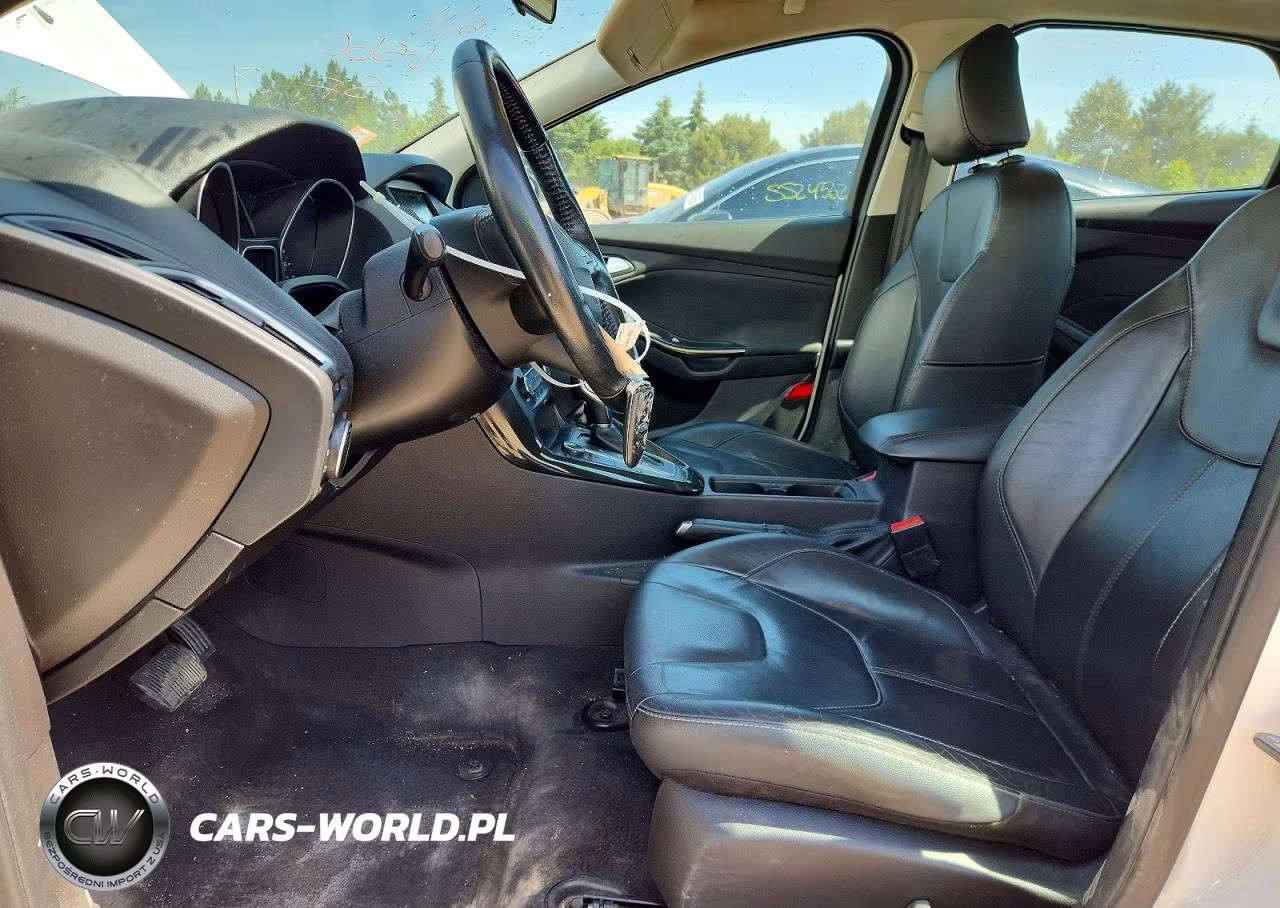 2015 Ford Focus Titanium VIN:1FADP3J27FL273934 - 7