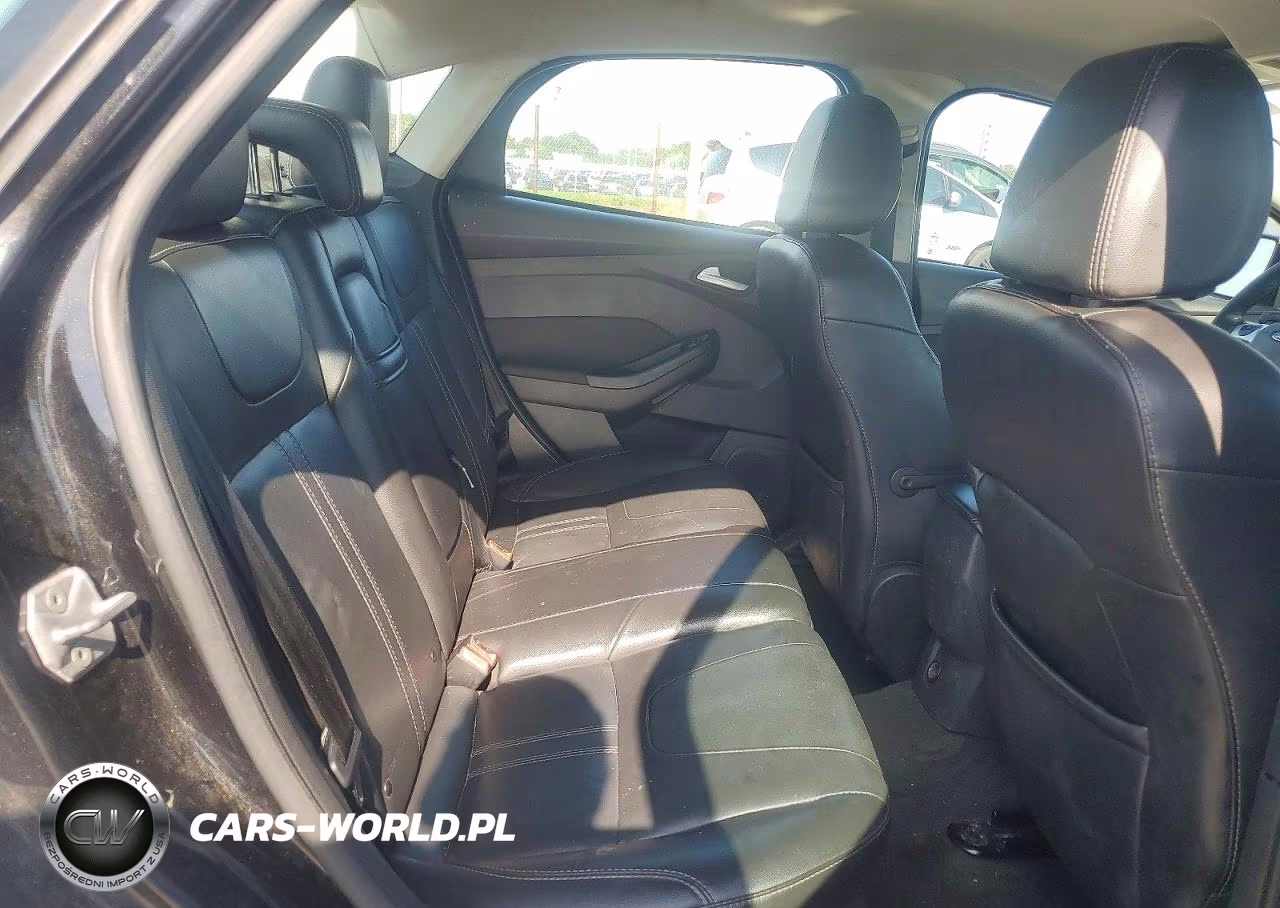 2013 Ford Focus Titanium VIN:1FADP3J26DL276207 - 10