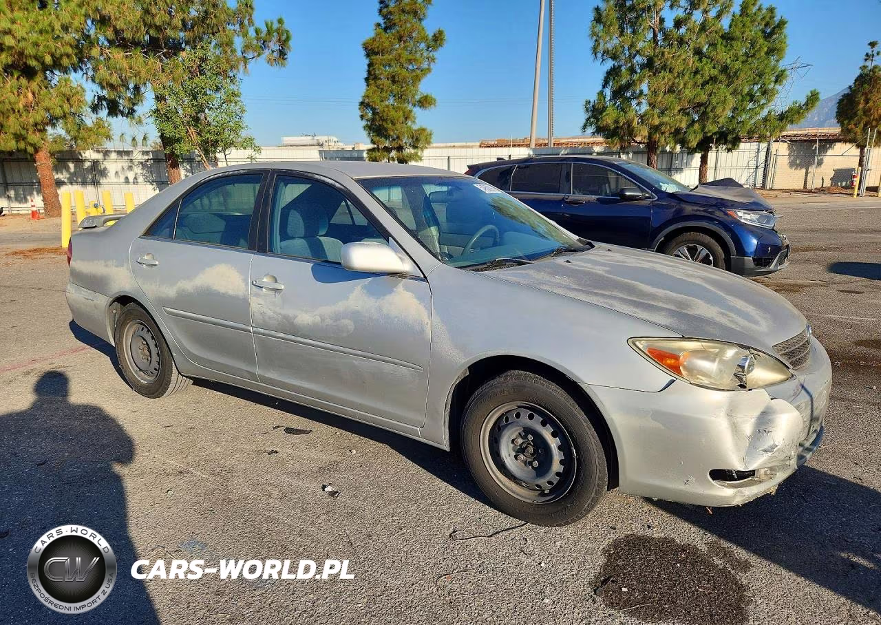 2002 Toyota Camry Le VIN:JTDBE32K120101853 - 4