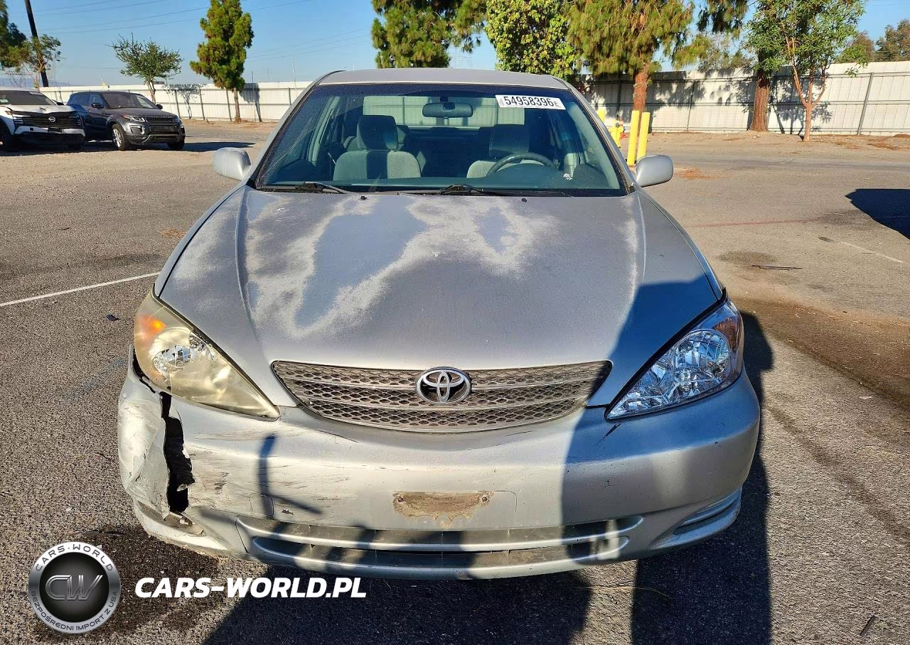 2002 Toyota Camry Le VIN:JTDBE32K120101853 - 5