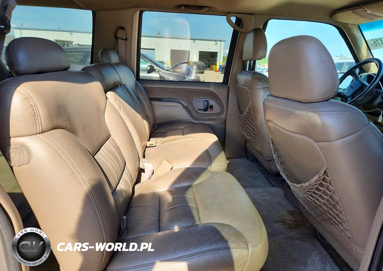 1999 GMC Suburban K1500 VIN:3GKFK16R6XG537420 - 11