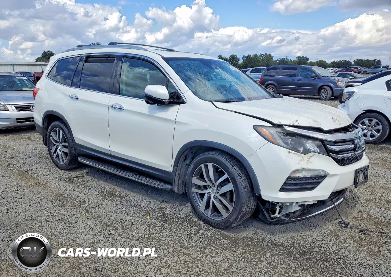 2018 Honda Pilot Touring VIN:5FNYF5H90JB026974 - 4
