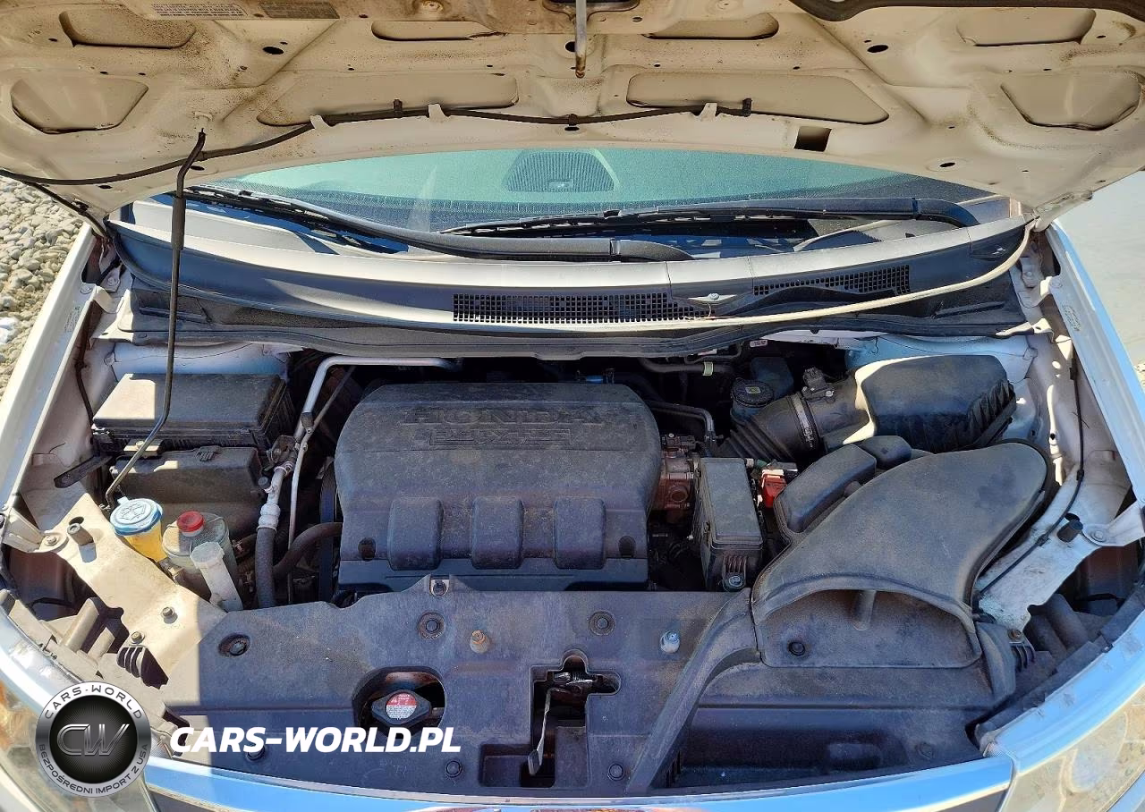 2012 Honda Odyssey Touring VIN:5FNRL5H90CB143292 - 12