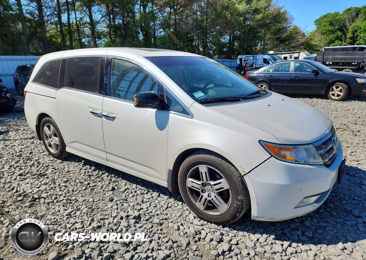 2012 Honda Odyssey Touring VIN:5FNRL5H90CB143292 - 4