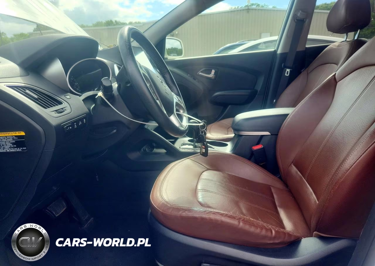 2012 Hyundai Tucson Limited VIN:KM8JUCAC4CU534212 - 7