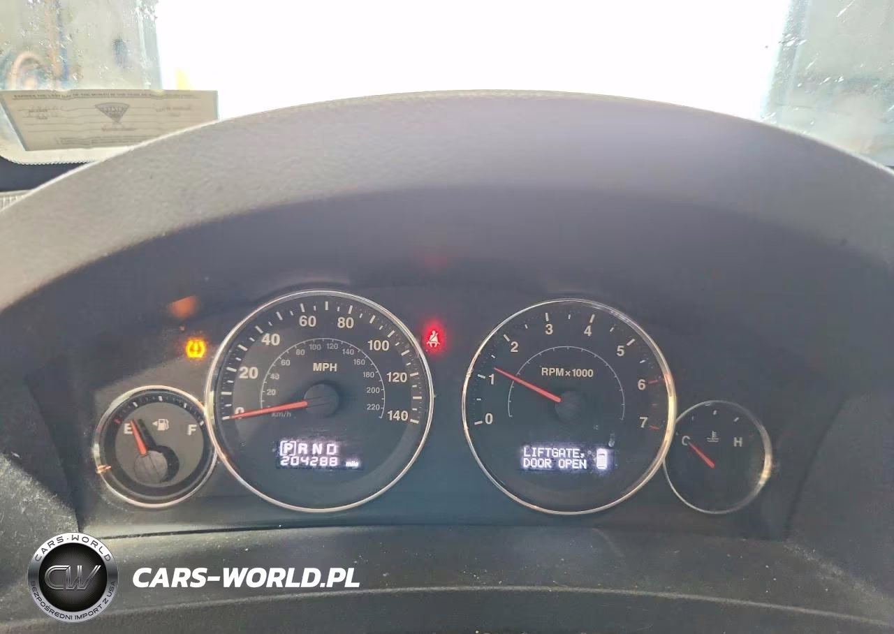 2009 Jeep Grand Cherokee Laredo VIN:1J8GR48K79C521710 - 9