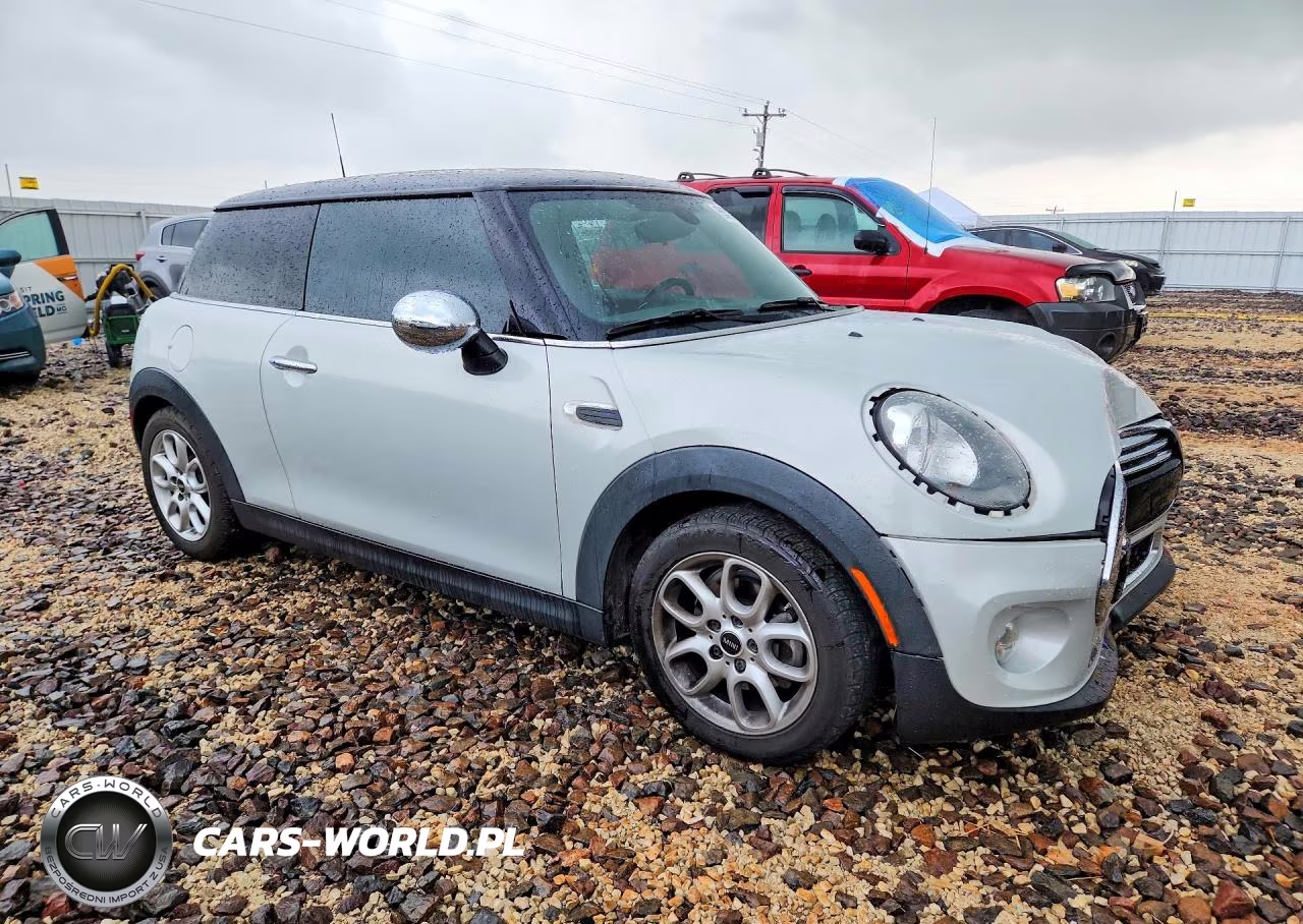 2015 Mini Cooper VIN:WMWXM5C56FT942422 - 4