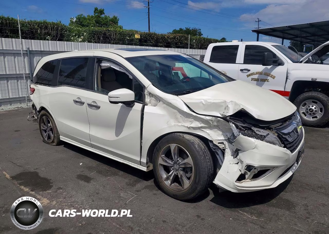 2019 Honda Odyssey Touring VIN:5FNRL6H82KB051371 - 4