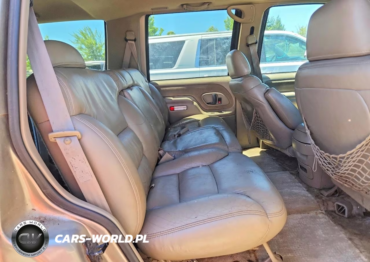 1999 GMC Yukon VIN:1GKEK13R0XJ734825 - 11