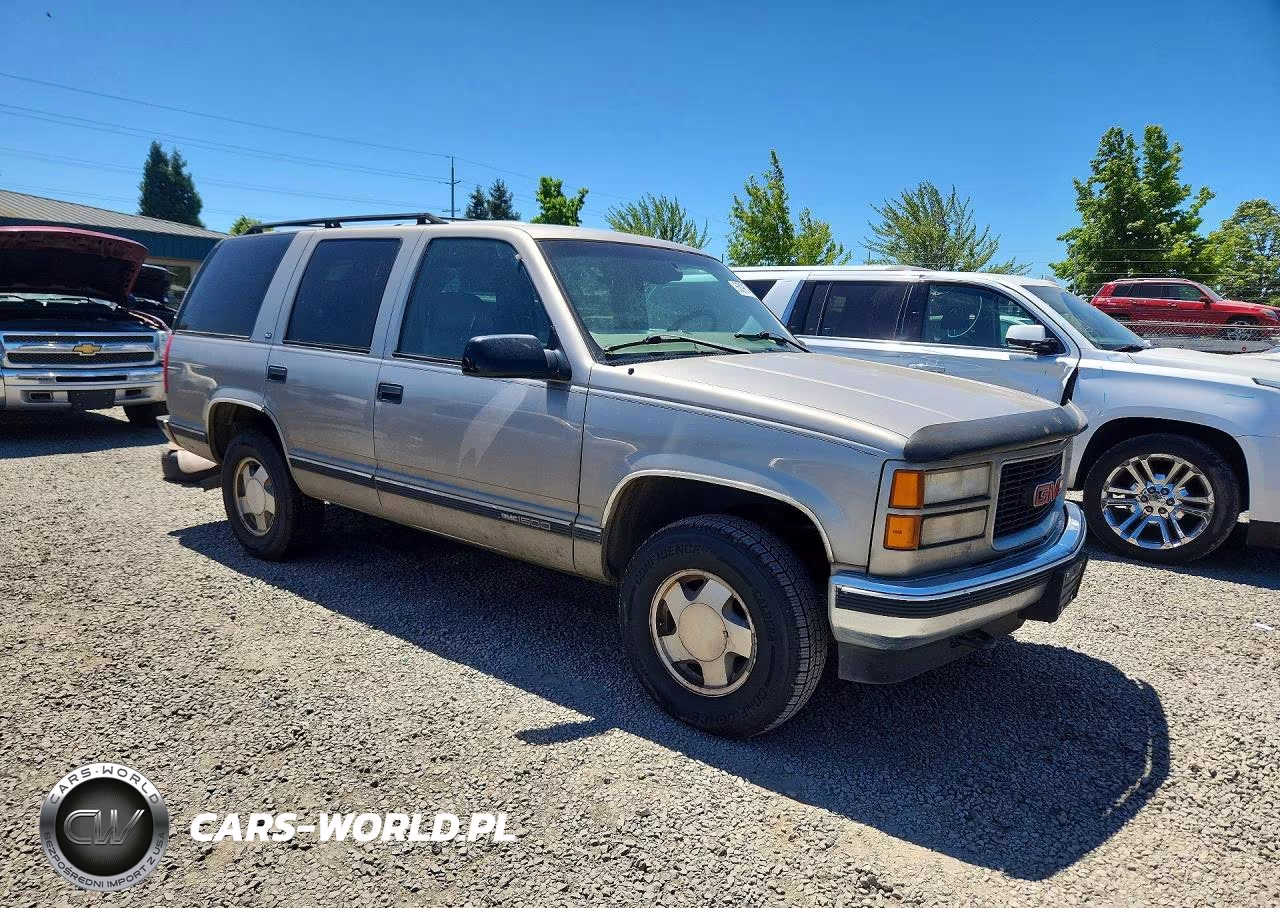 1999 GMC Yukon VIN:1GKEK13R0XJ734825 - 4