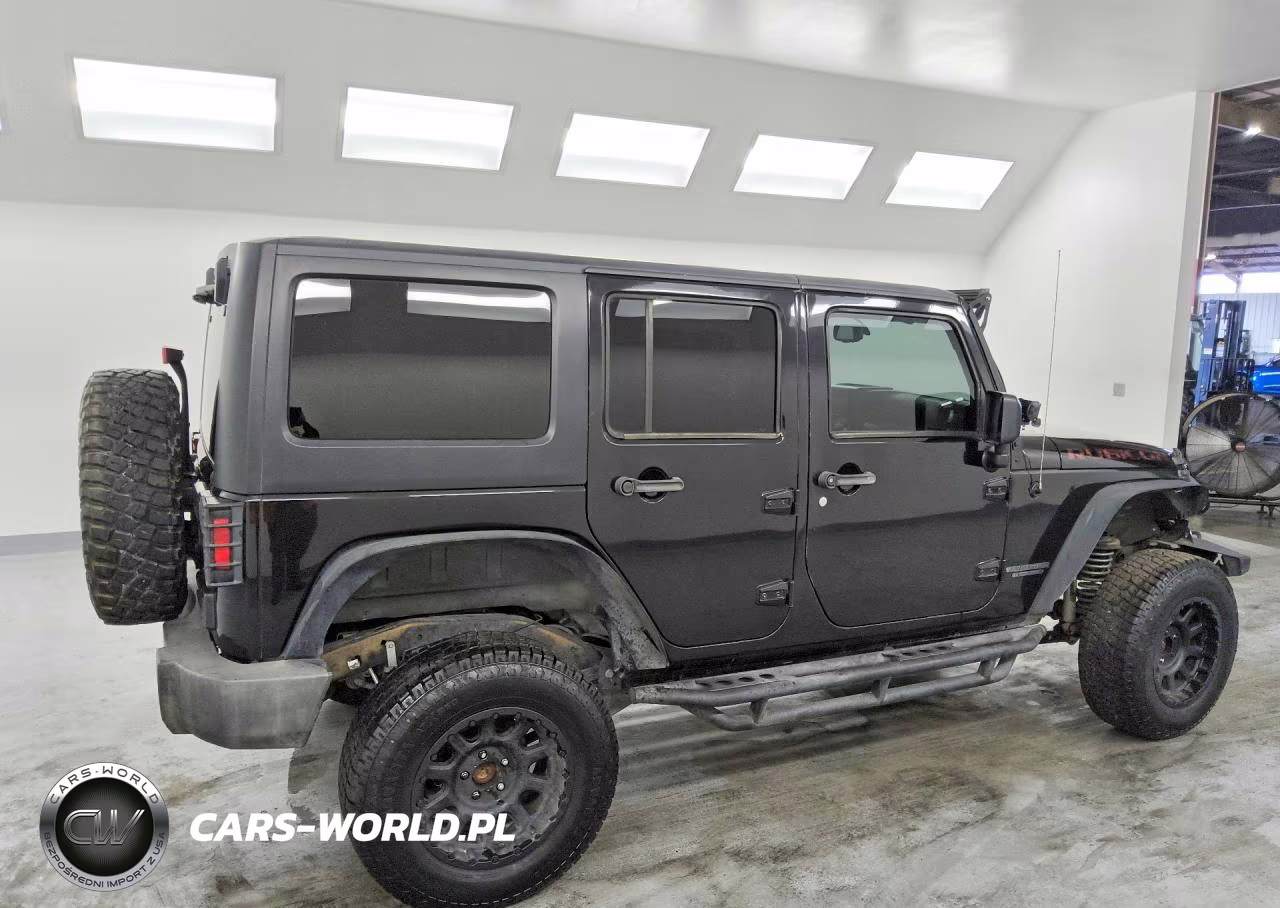2013 Jeep Wrangler Unlimited Rubicon VIN:1C4BJWFG2DL699603 - 3