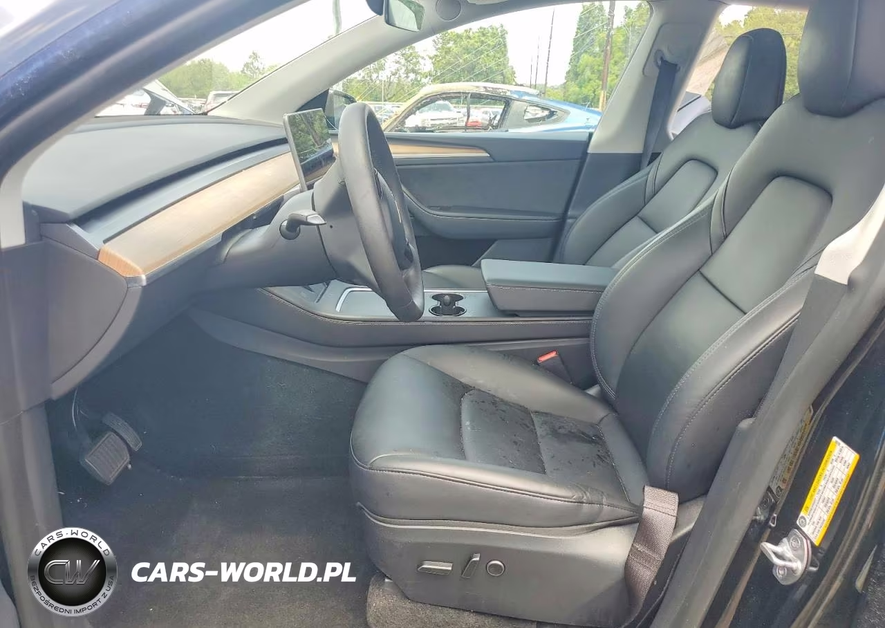 2023 Tesla Model Y VIN:7SAYGDEE6PA188769 - 7