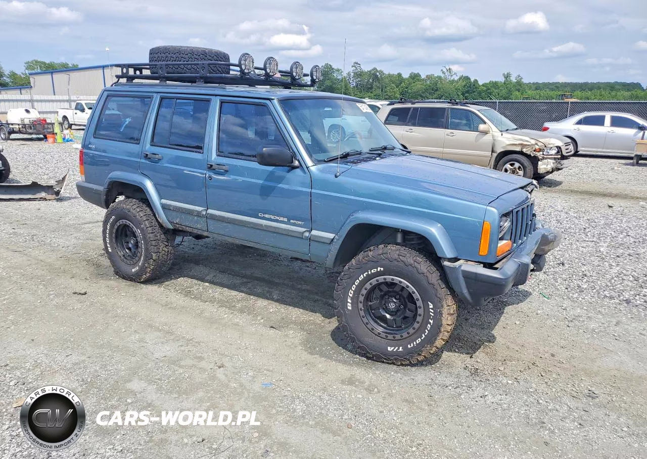 1999 Jeep Cherokee Sport VIN:1J4FF68S2XL634687 - 4