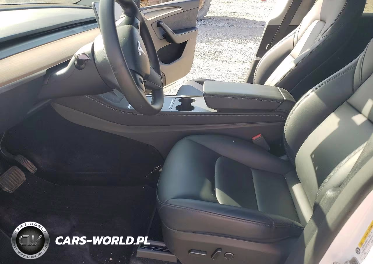 2023 Tesla Model Y VIN:7SAYGDEE0PA077165 - 7