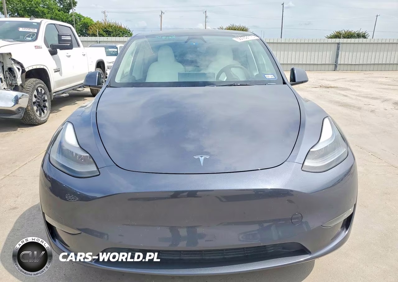 2023 Tesla Model Y VIN:7SAYGDEE2PA211609 - 5