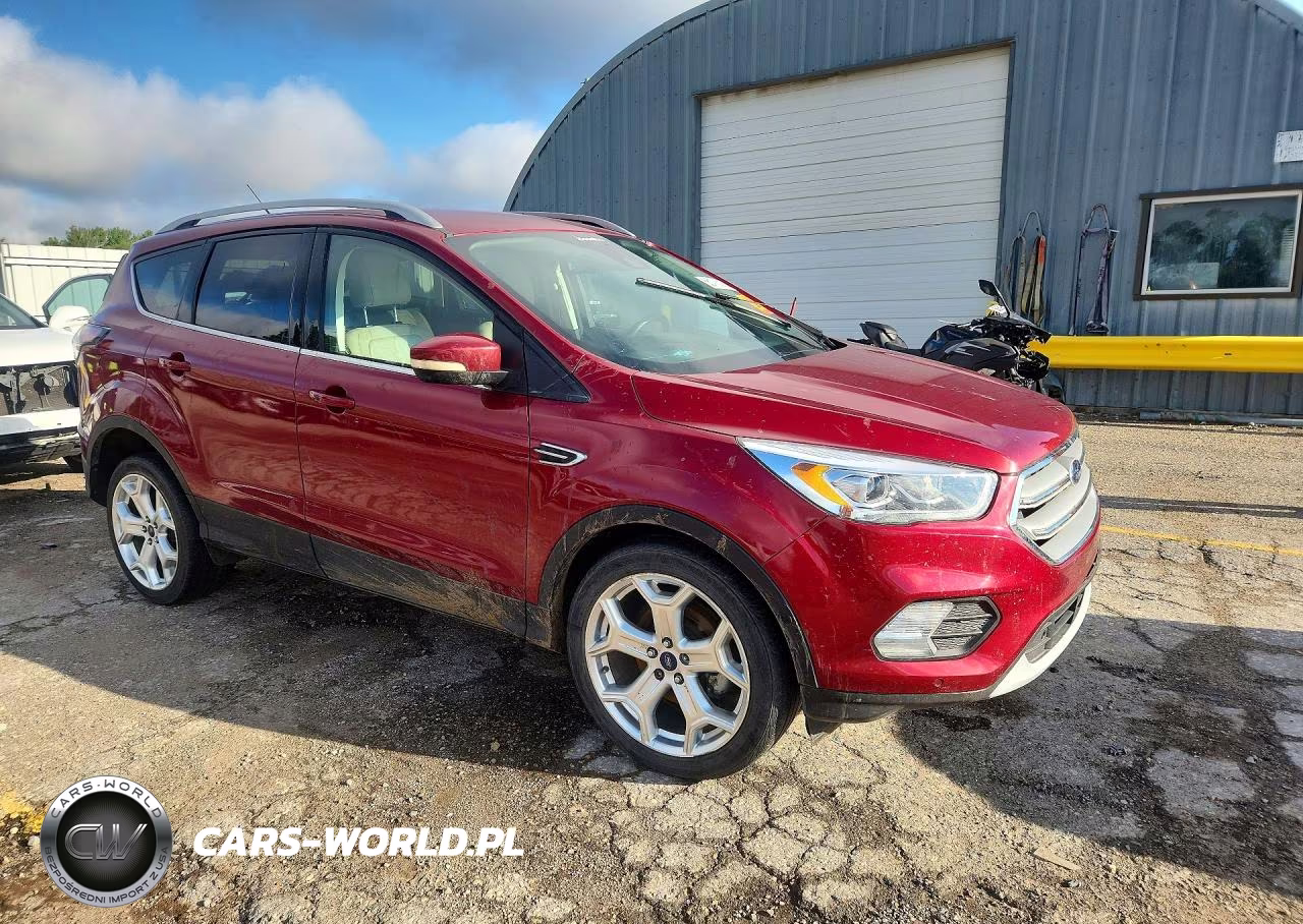 2017 Ford Escape Titanium VIN:1FMCU0JD4HUB12710 - 4