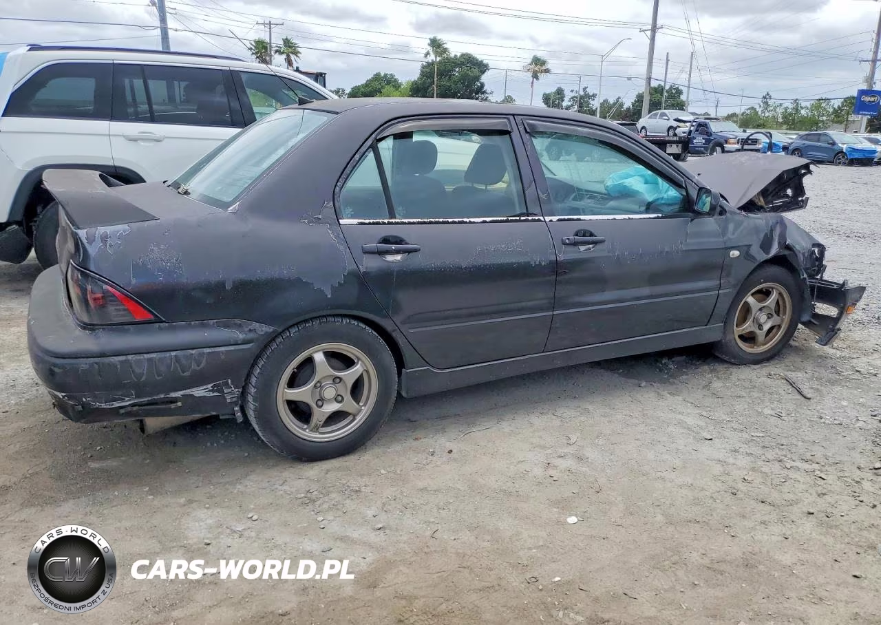 2002 Mitsubishi Lancer Oz Rally VIN:JA3AJ86E92U027064 - 3