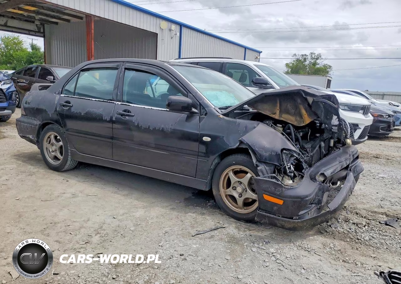 2002 Mitsubishi Lancer Oz Rally VIN:JA3AJ86E92U027064 - 4