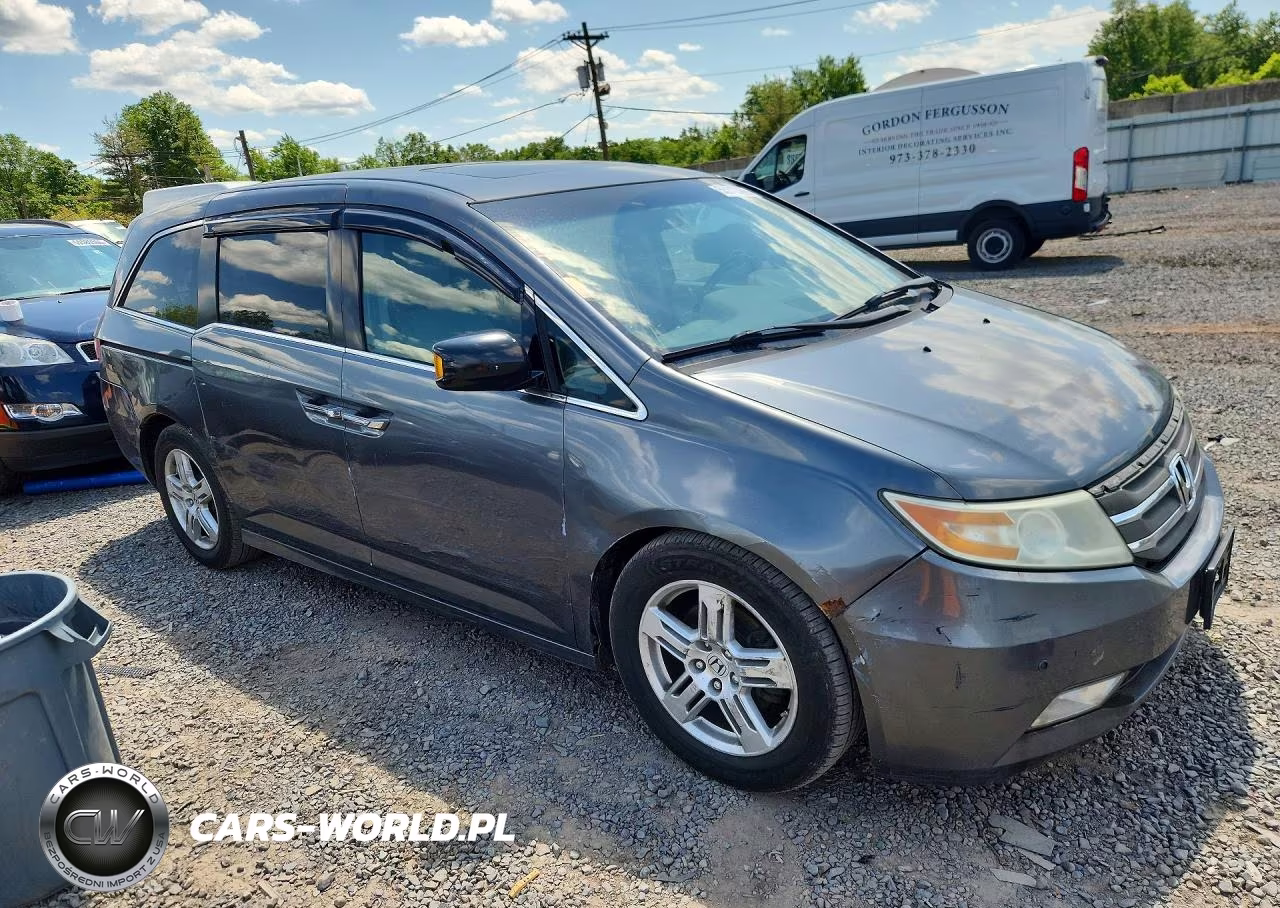 2011 Honda Odyssey Touring-Touring Elite VIN:5FNRL5H94BB025387 - 4