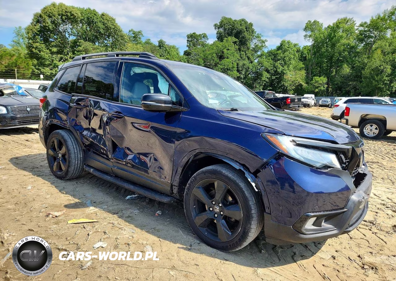 2019 Honda Passport Elite VIN:5FNYF8H0XKB018286 - 4