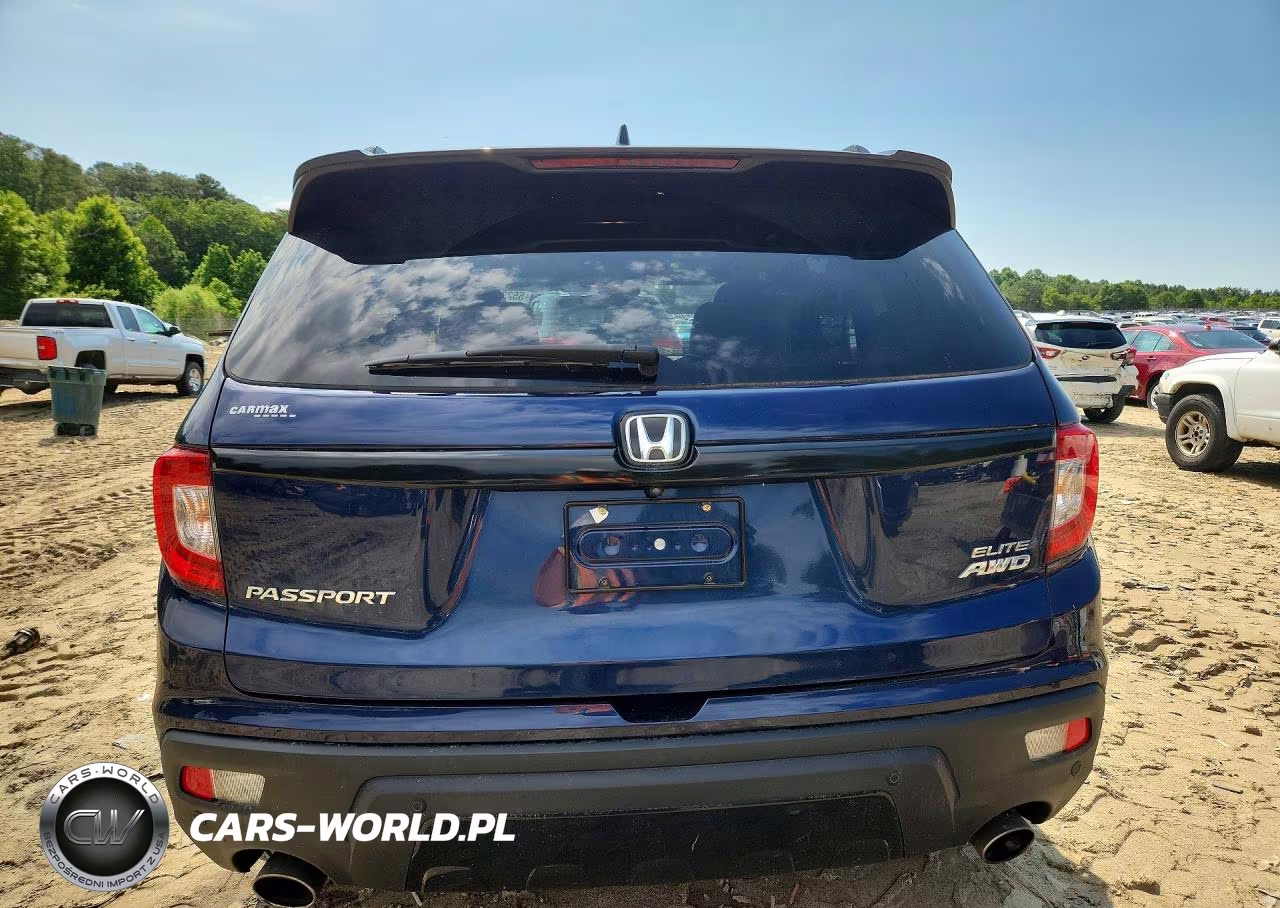 2019 Honda Passport Elite VIN:5FNYF8H0XKB018286 - 6