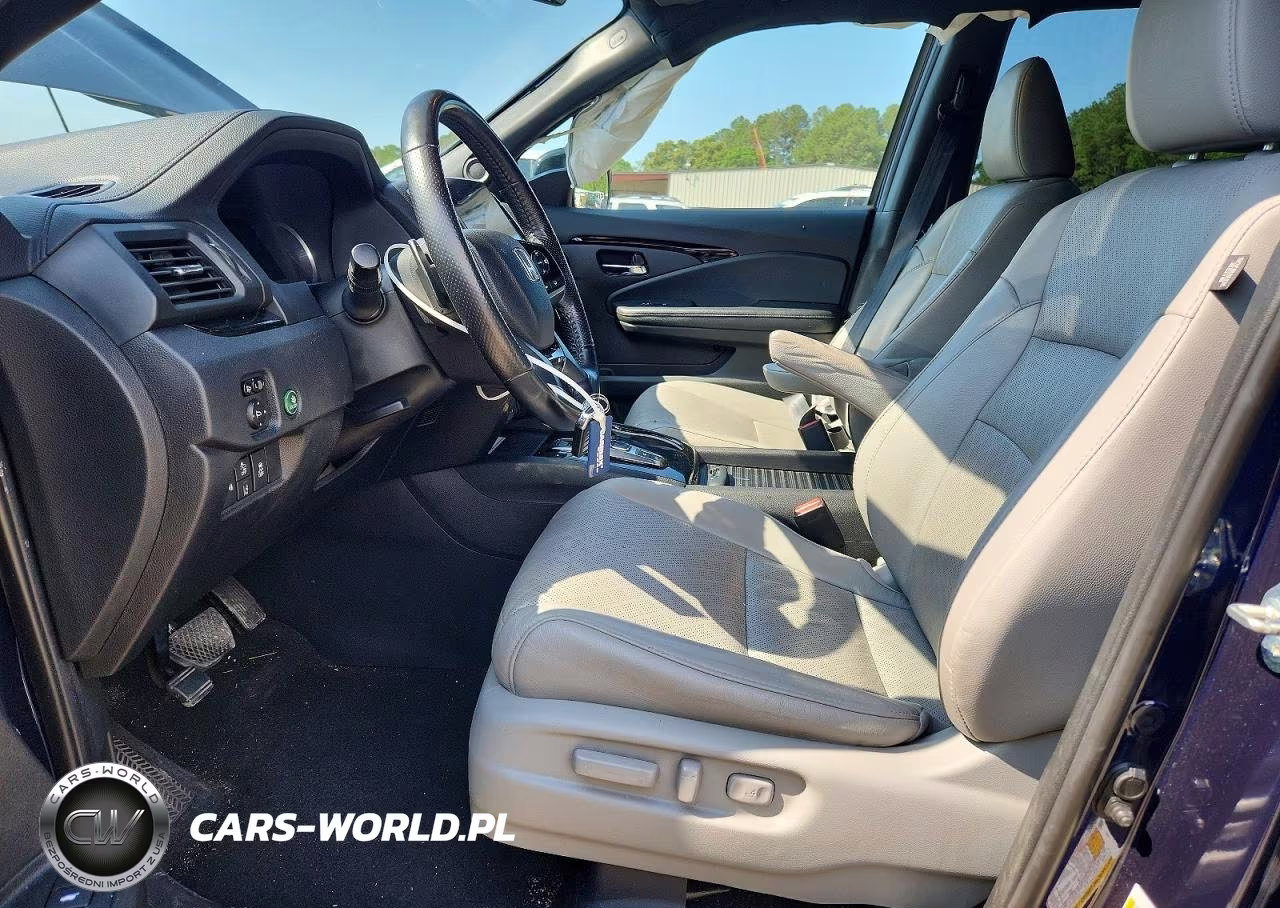 2019 Honda Passport Elite VIN:5FNYF8H0XKB018286 - 7
