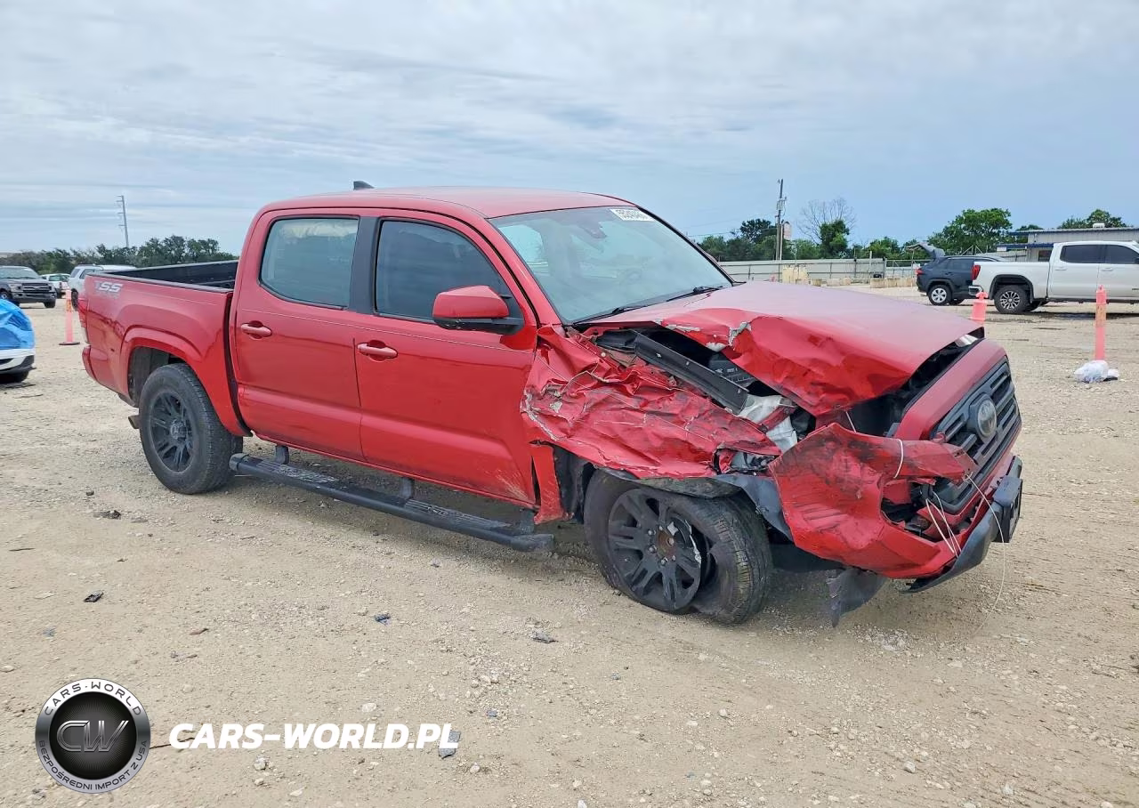 2018 Toyota Tacoma Sr VIN:5TFAX5GN5JX128094 - 4