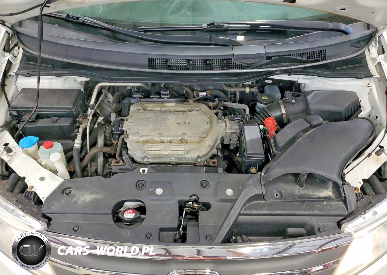 2012 Honda Odyssey Touring VIN:5FNRL5H96CB120633 - 12