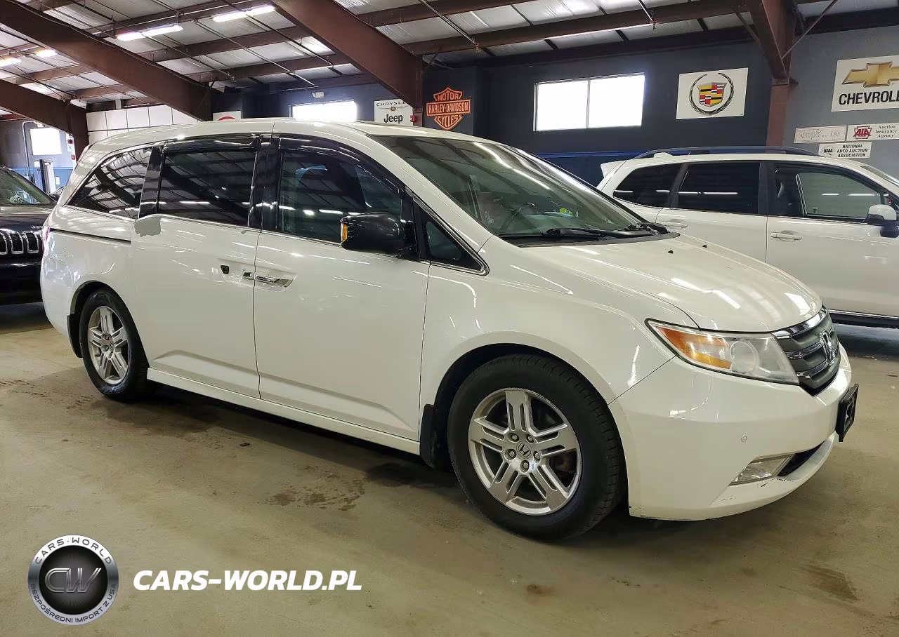 2012 Honda Odyssey Touring VIN:5FNRL5H96CB120633 - 4