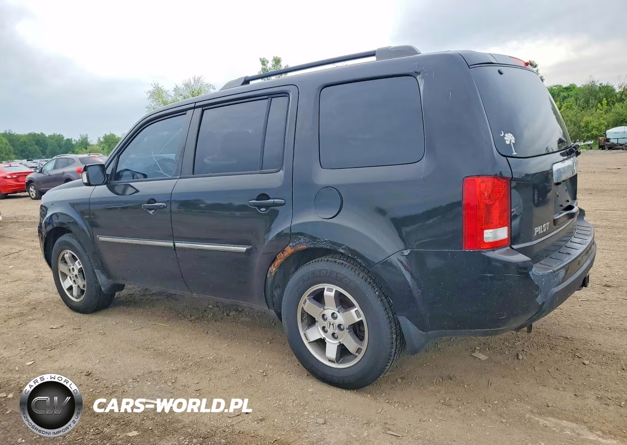 2011 Honda Pilot Touring VIN:5FNYF4H9XBB096400 - 2