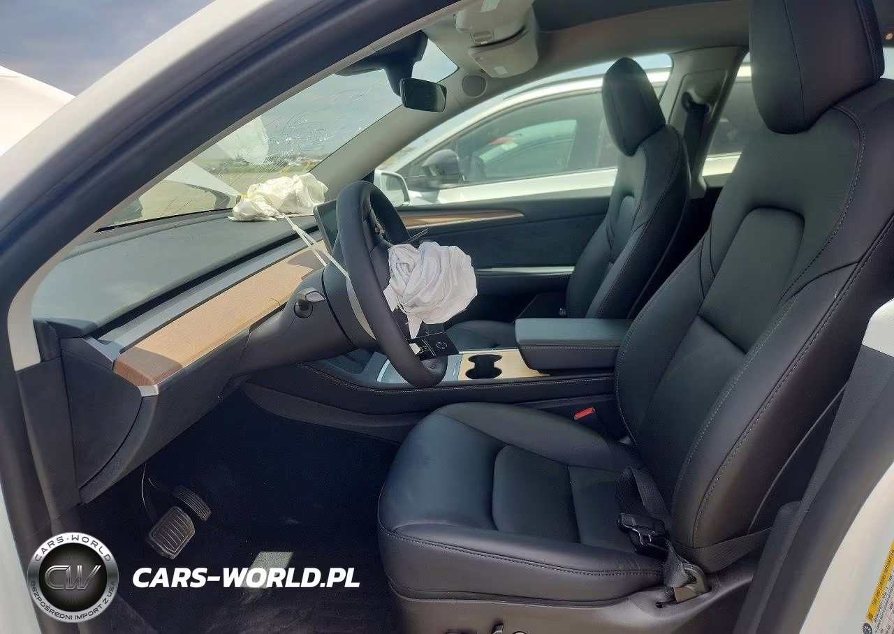 2023 Tesla Model Y VIN:7SAYGDEE0PF584912 - 7