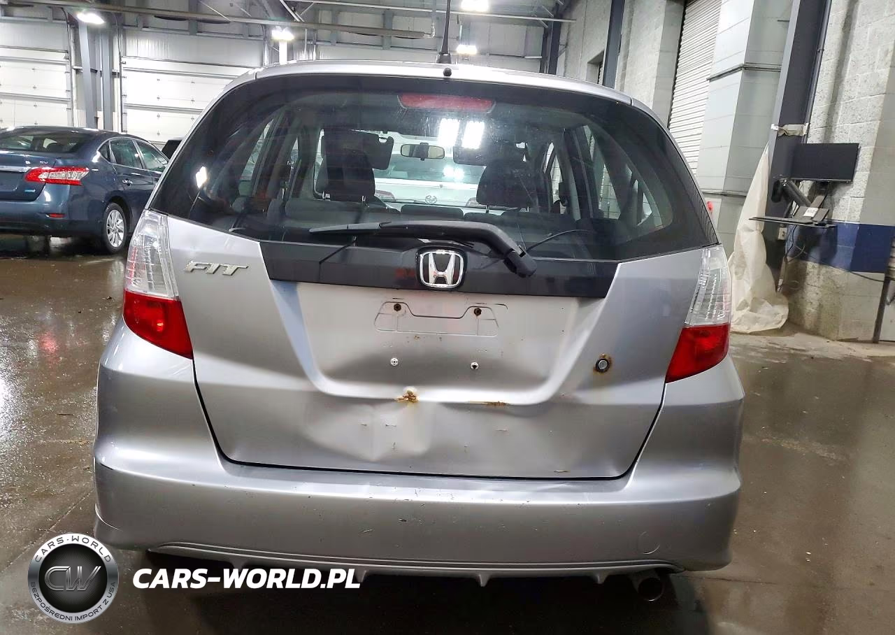 2009 Honda Fit VIN:JHMGE88259S050655 - 6