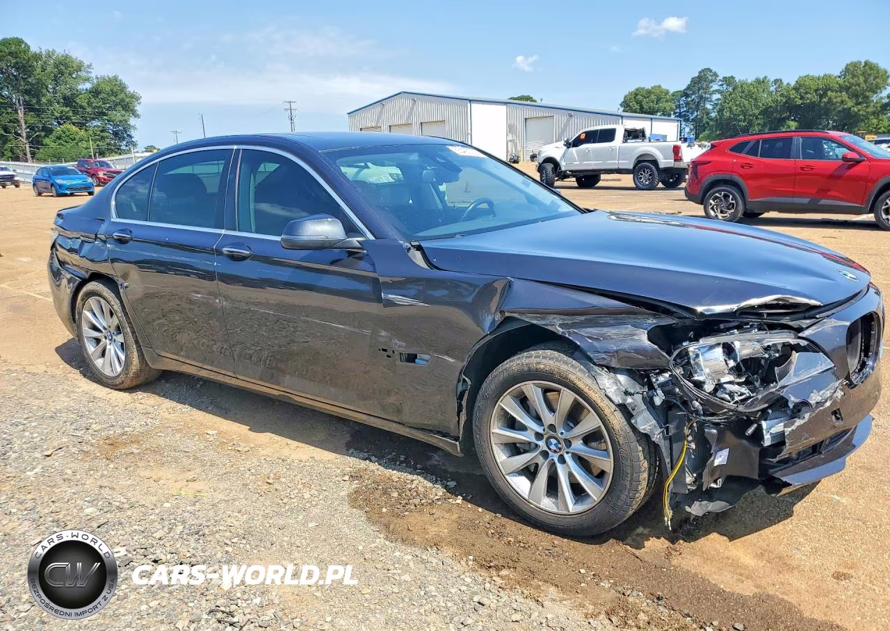 2015 BMW 740 I VIN:WBAYA6C59FGK16582 - 4